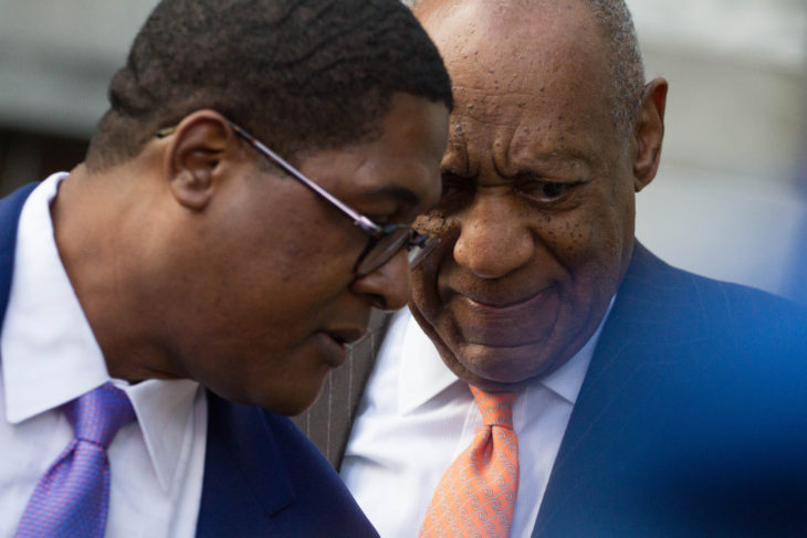 Actor Bill Cosby (R) and spokesman Andrew Wyatt arrive for day 2 of Cosby's sexual assault re-trial at the Montgomery County Courthouse in Norristown, PA, April 10, 2018.