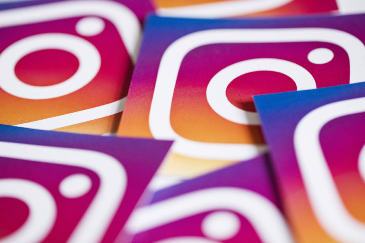 OXFORD, UK - NOVEMBER 17th 2016: A collection of Instagram logos printed onto paper. Instagram is a popular social media application for sharing images and videos