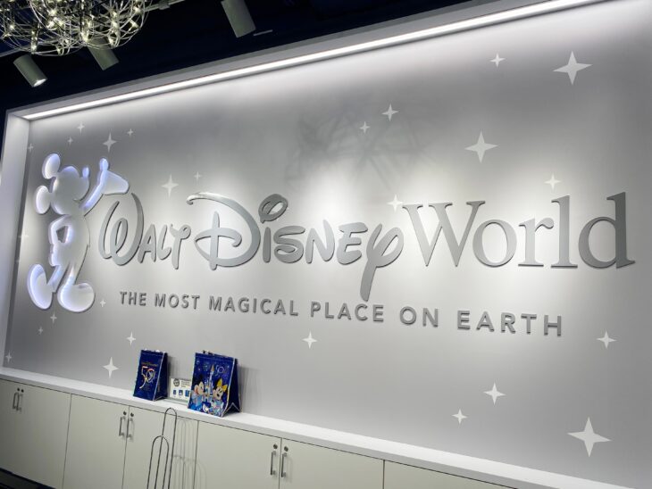 Orlando, Florida - June 26, 2023: A sign at the Orlando International Airport for the Walt Disney World Resort, the Most Magical Place on Earth.